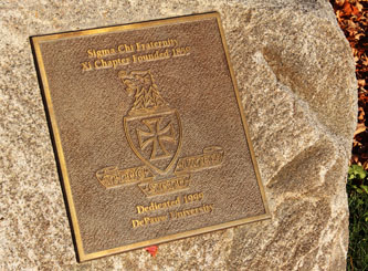 plaque on the rock outside
